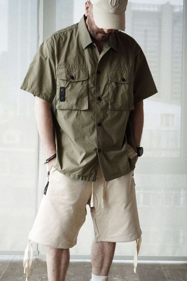 military shirt. short sleeve. khaki green